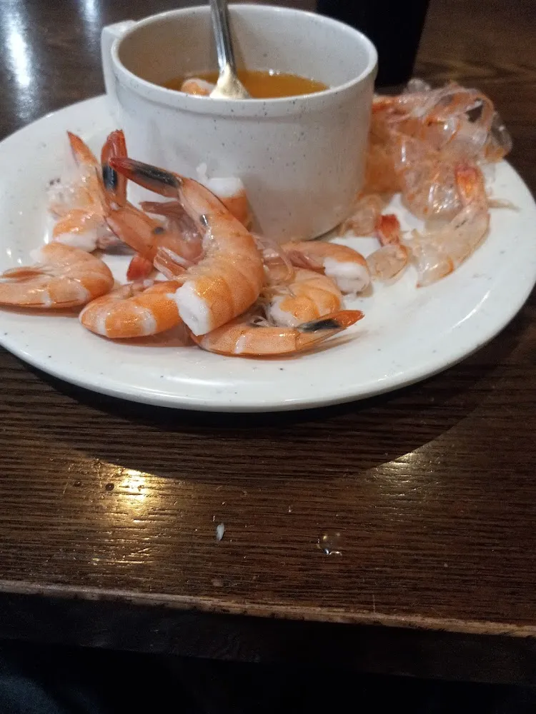 Easy Peal Shrimp on Ice Just Dip in Hot Butter It's Fantastic